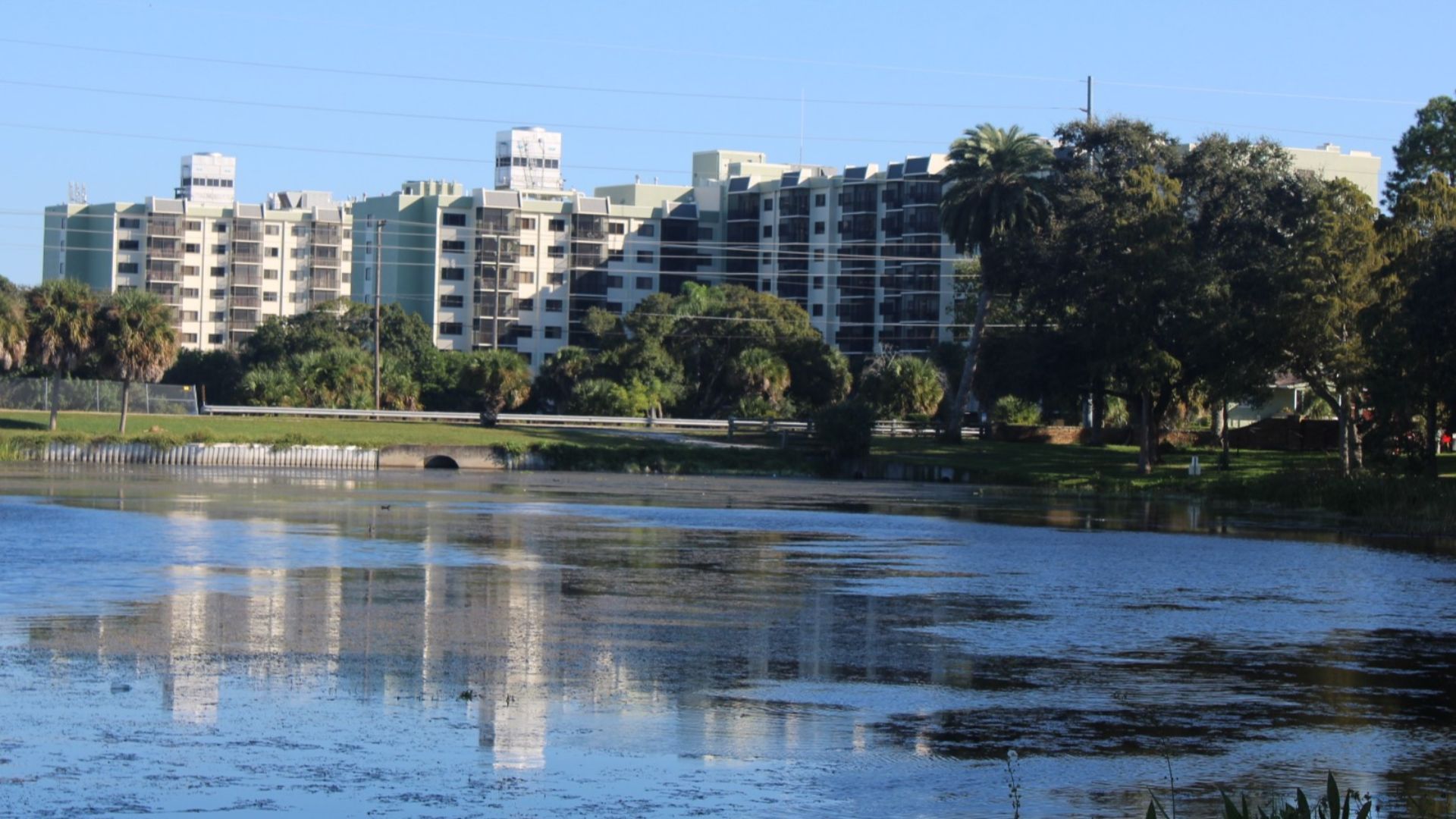 File:Elmcroft of Pinecrest in Largo, Florida with image reflected in Taylor Lake.jpg