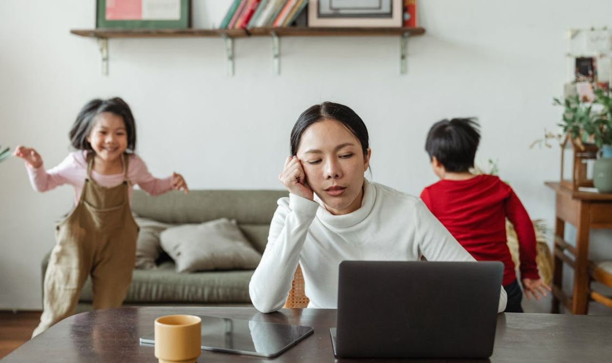Stressed woman working at home