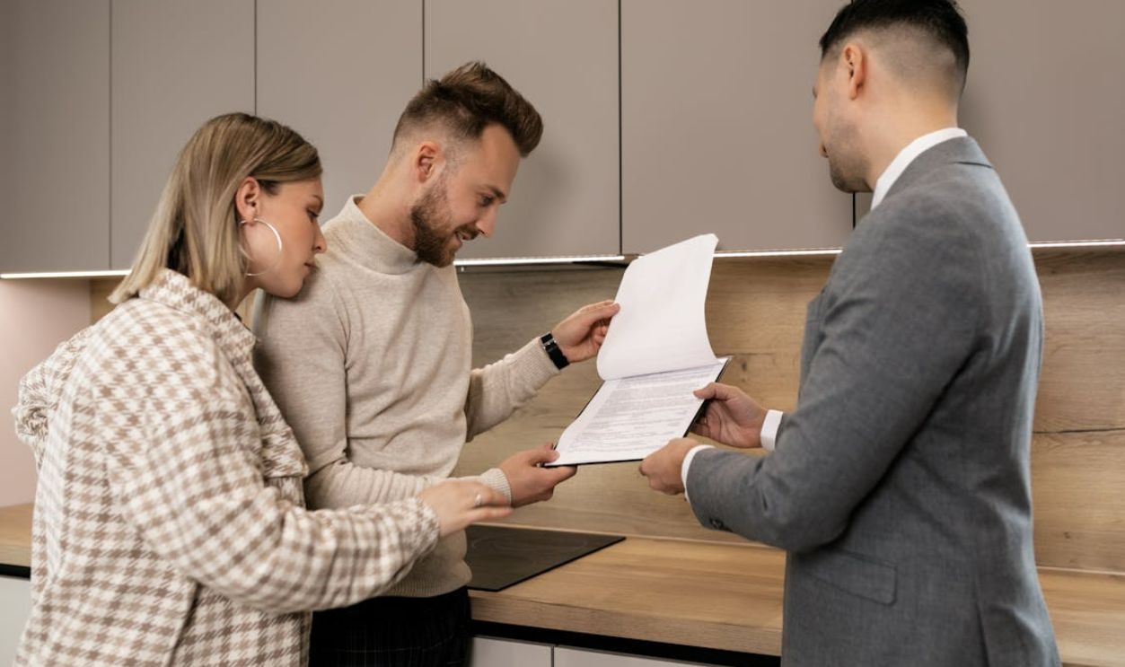 Real estate agent with client