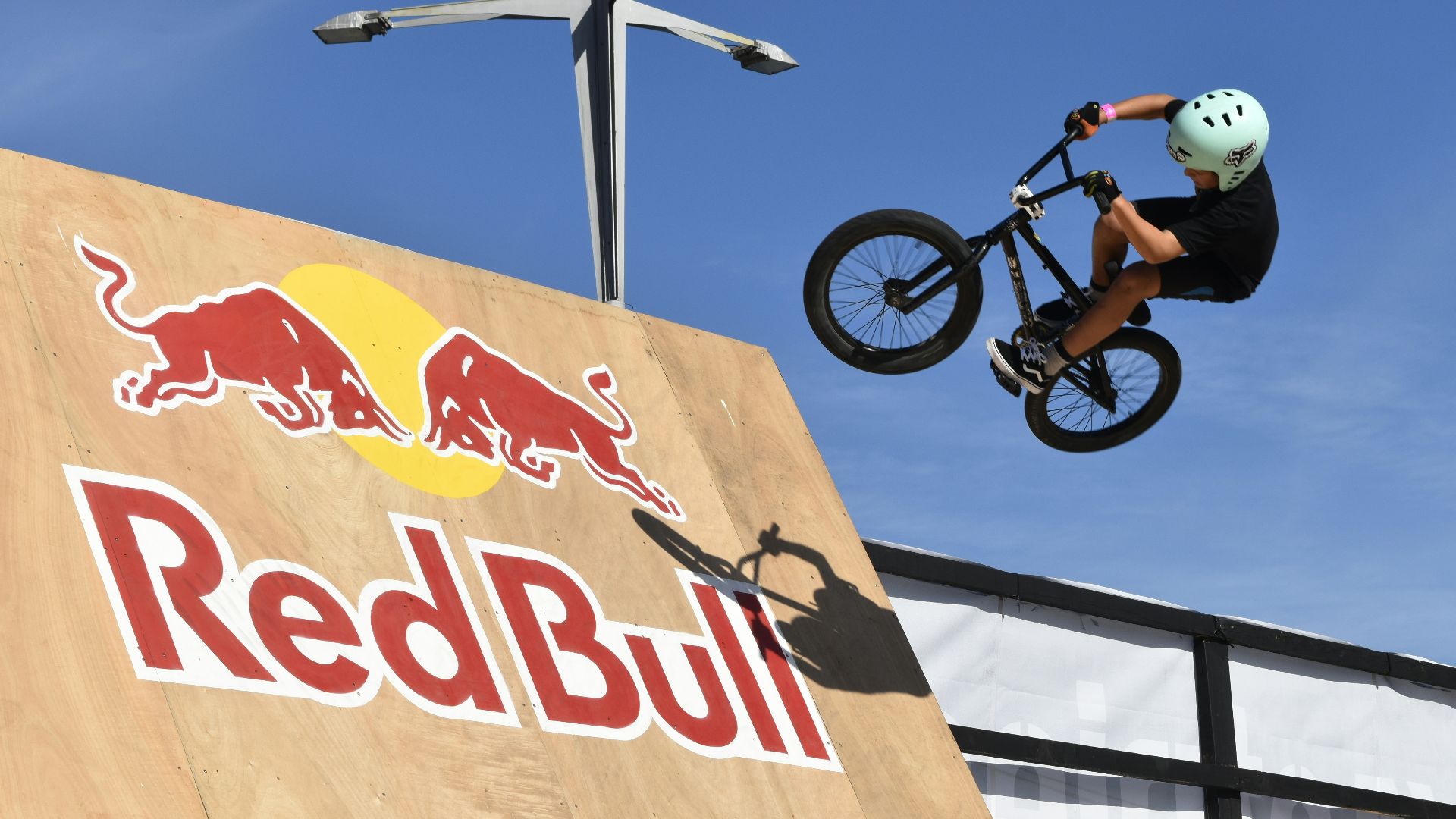 man riding BMX bike during daytime