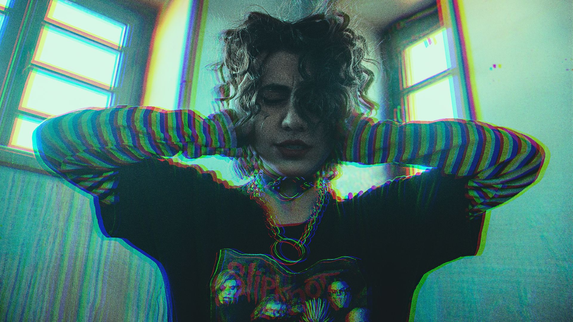 woman in blue and black striped long sleeve shirt