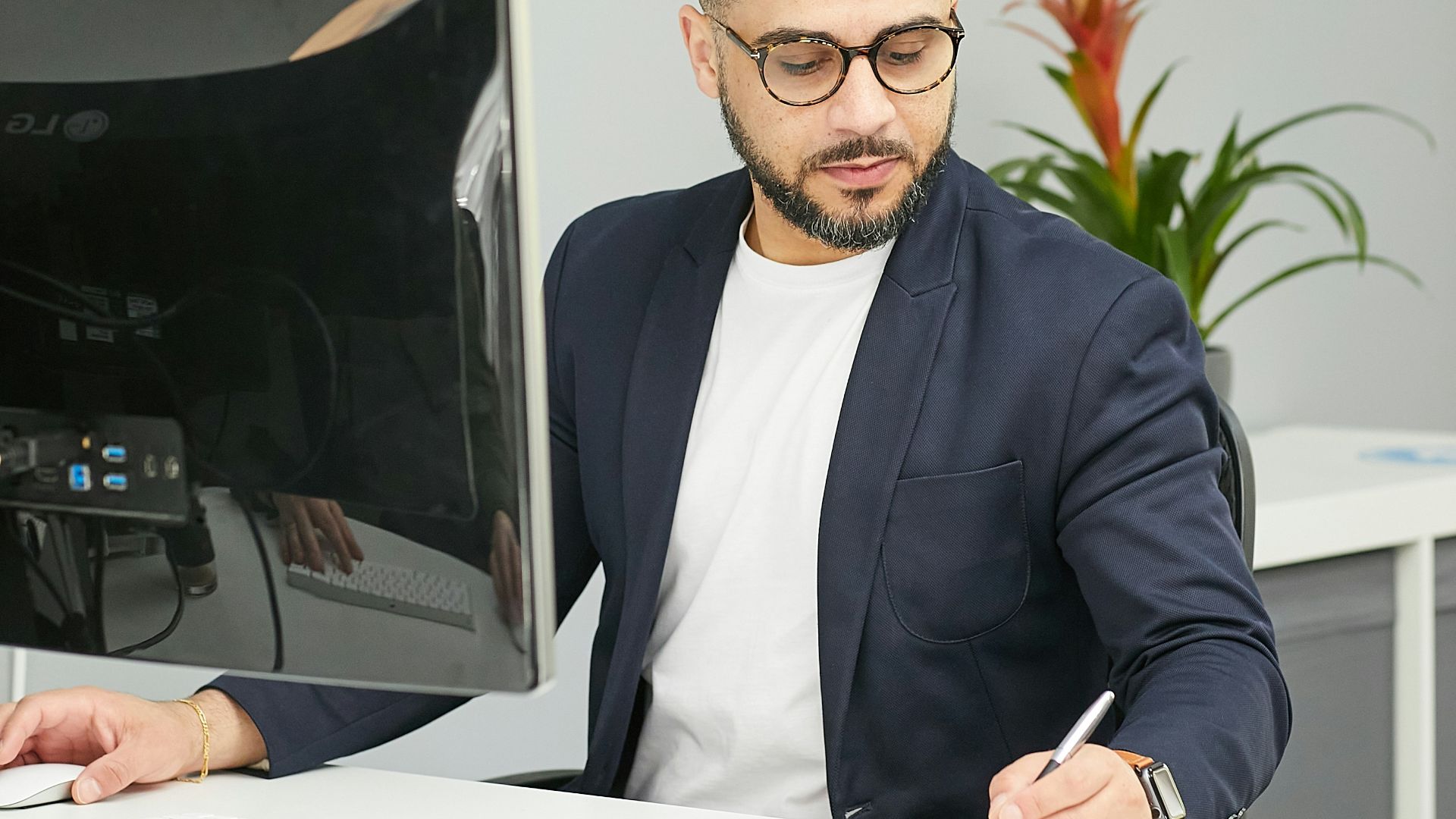 a man sitting at a desk