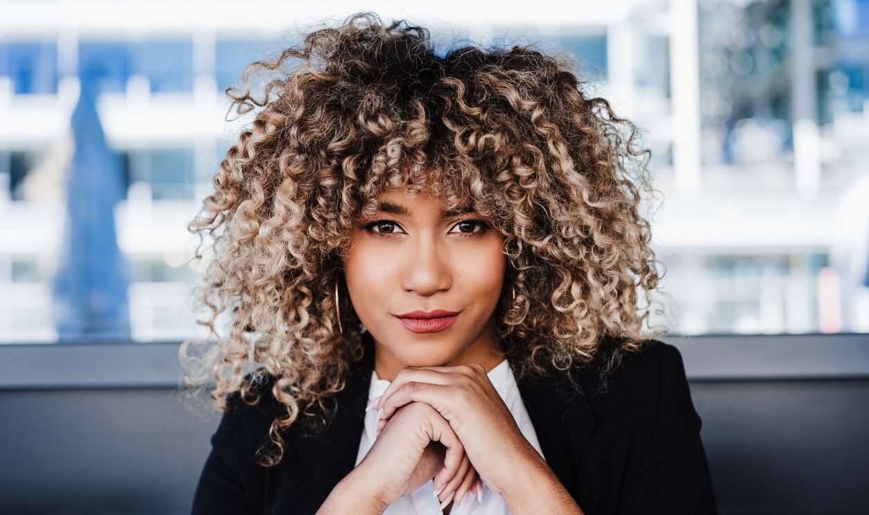 portrait of serious confident business woman in cafe. Business concept