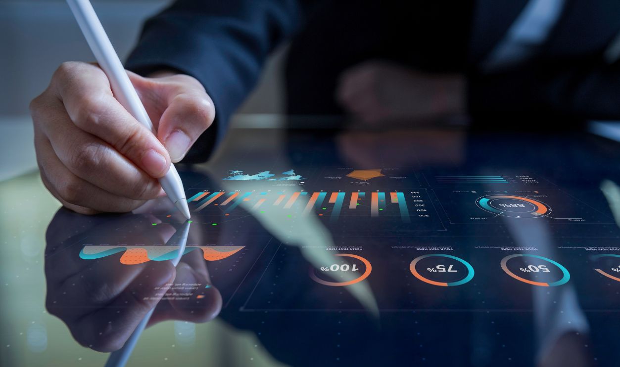 Futuristic business interface with real-time data analytics on touchscreen, tech presentations, websites, and innovation branding.