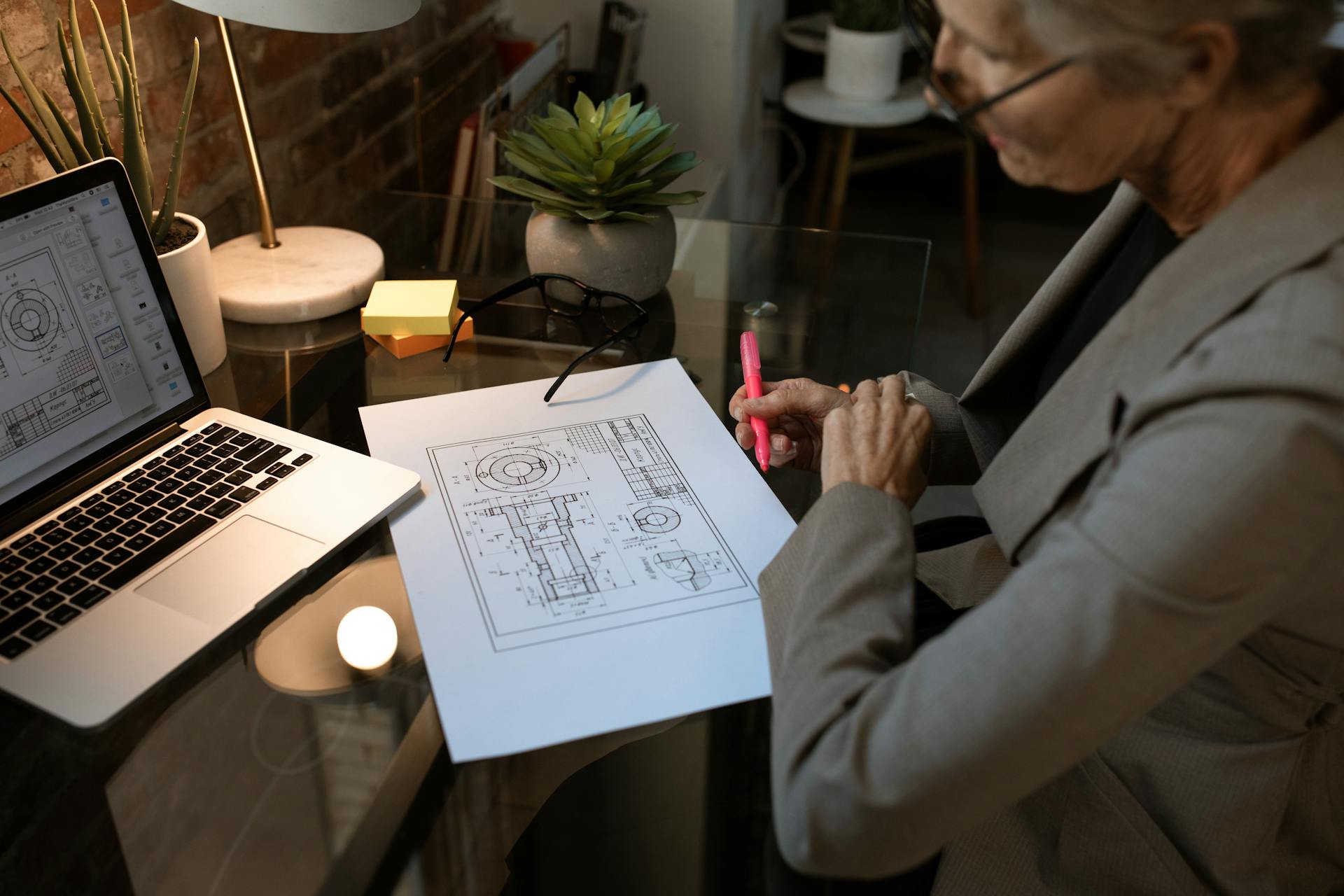 Woman looking at a house plan