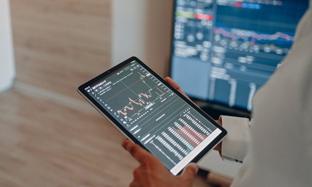 Person Using a Black Tablet