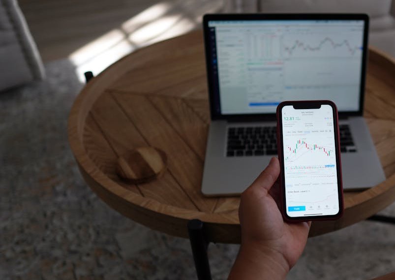 Close-Up Shot of a Person Holding a Cellphone