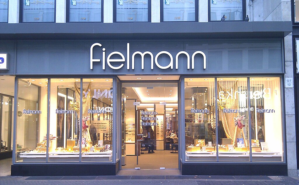 This is an eye-level, straight-on shot of a Fielmann store exterior.