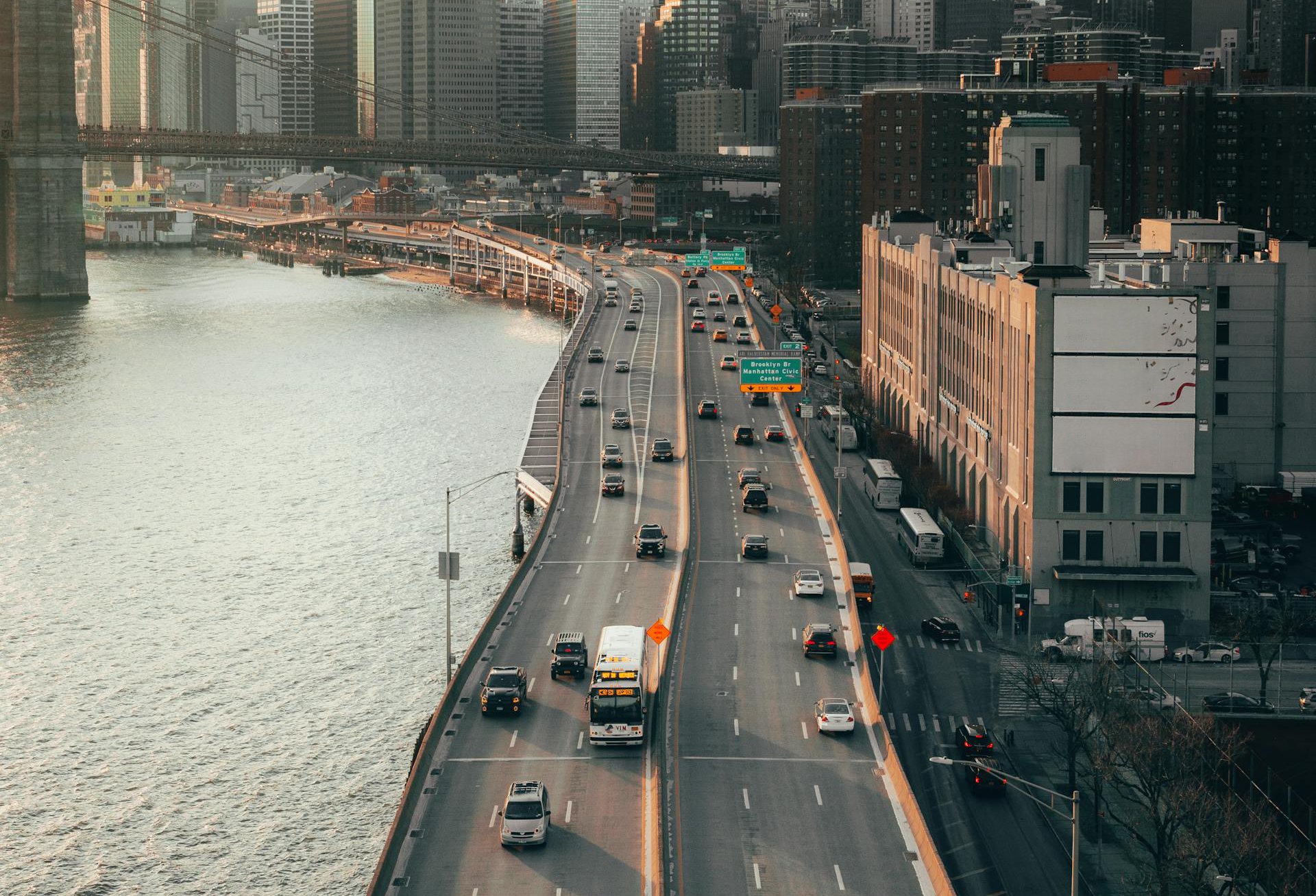 Buildings and a highway near a Near Body of Water