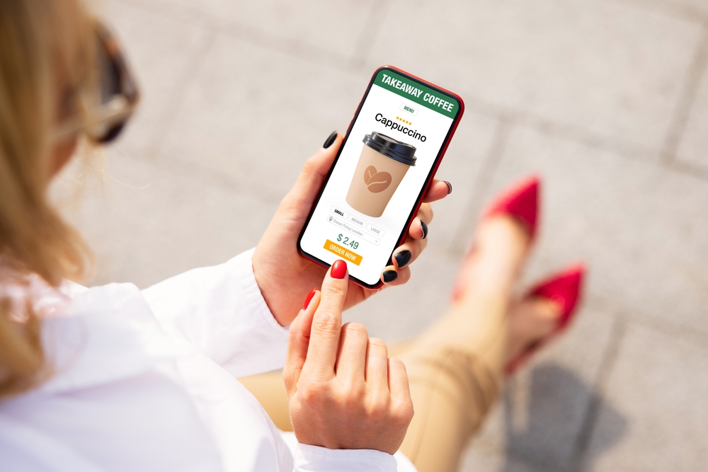 Woman ordering Starbucks coffee online