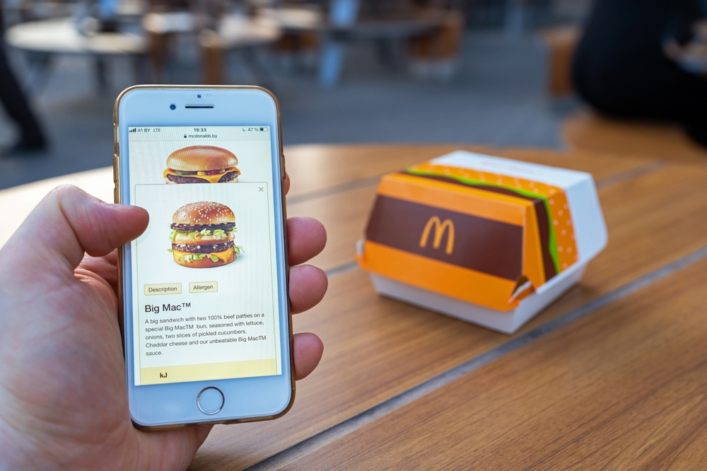 McDonald's website on smartphone screen close-up.