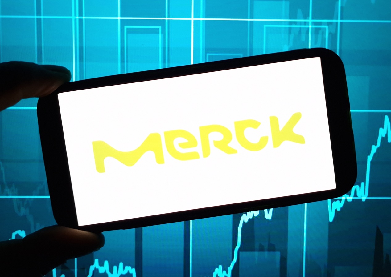 Merck KGaA company logo displayed on mobile phone - 2024