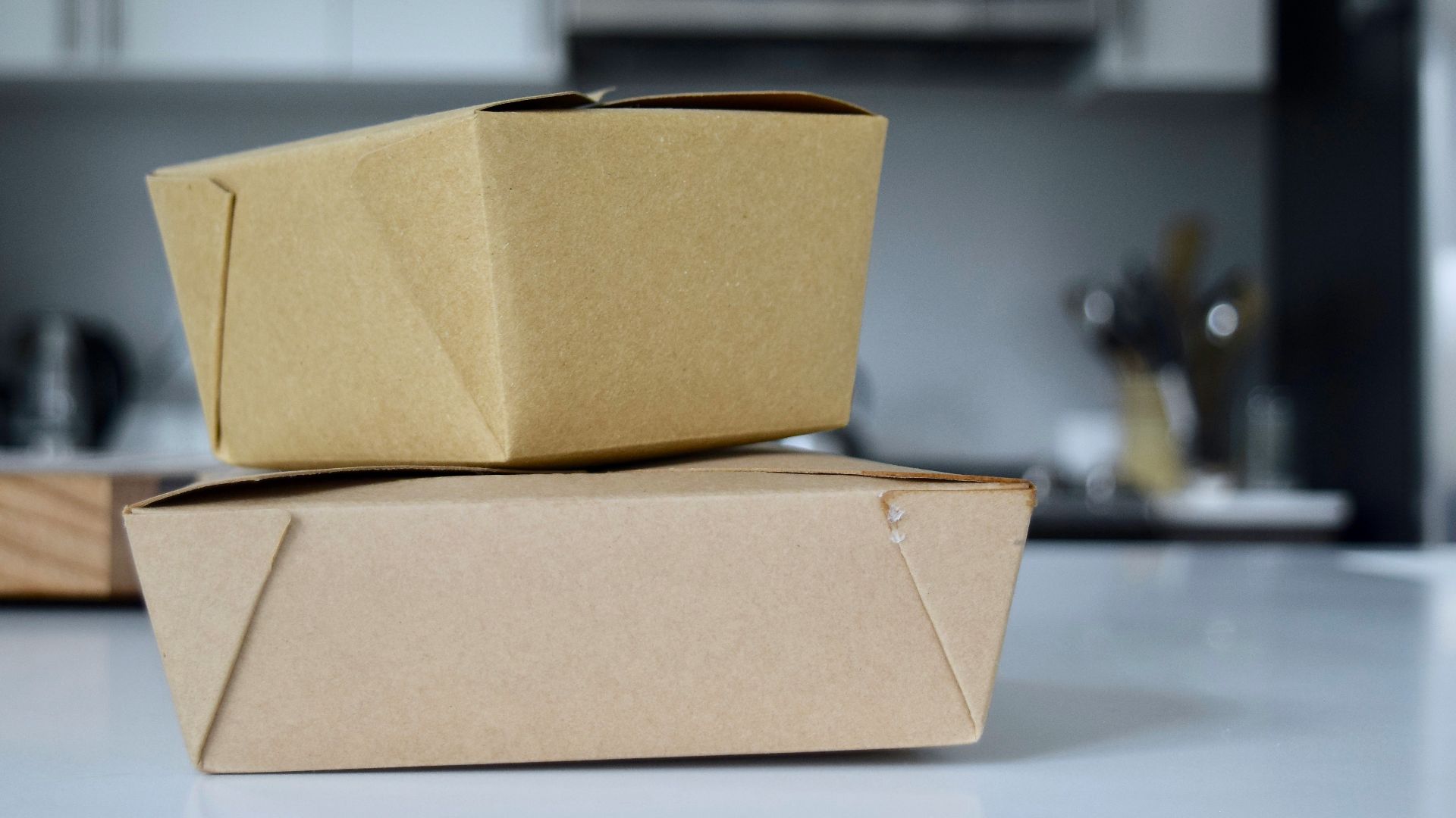 brown cardboard box on white table