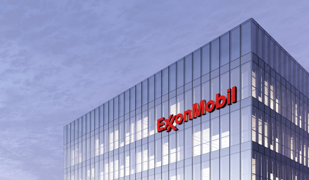 Photo of ExxonMobil Signage Logo on Top of Glass Building