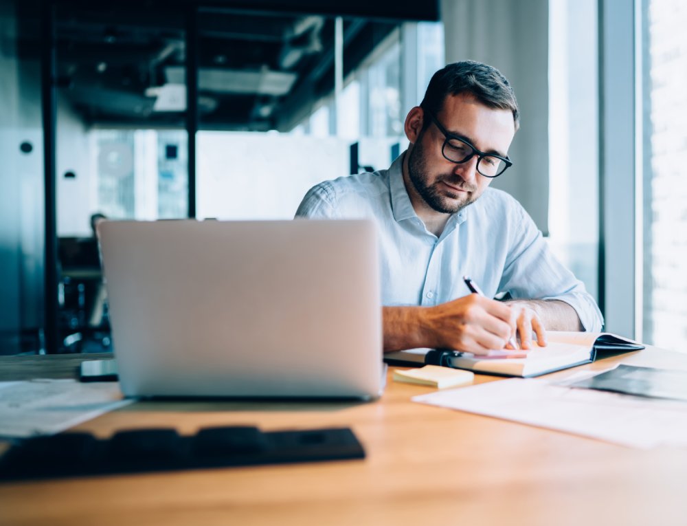 Professional expert working with information for business report