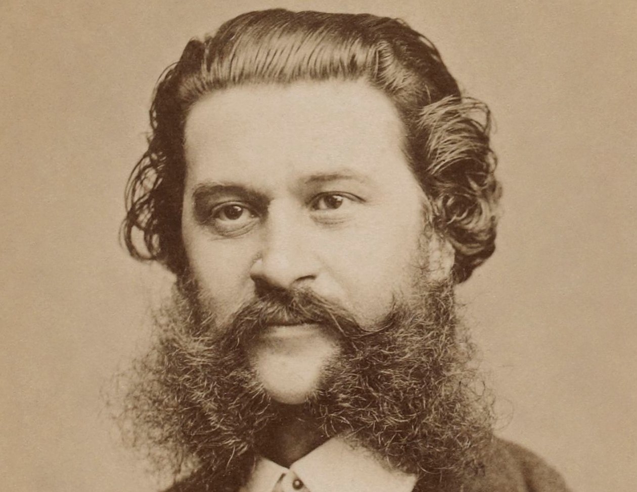Grayscale Portrait Photo of Johann Strauss Jr. facing the camera