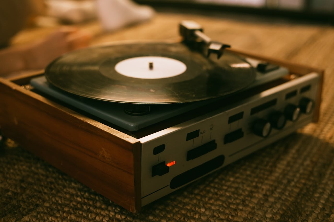 Close Up Photo of Vinyl Record Player Placed on a Table.