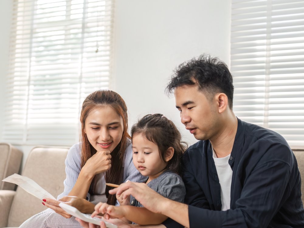 Family budgeting session with a focus on savings and financial education
