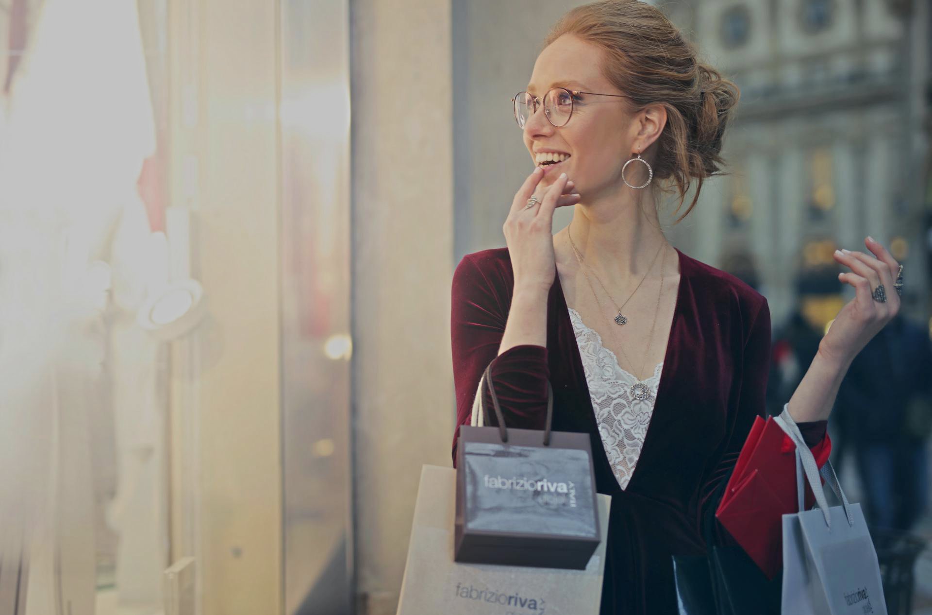 Woman Carrying Expensive Bags