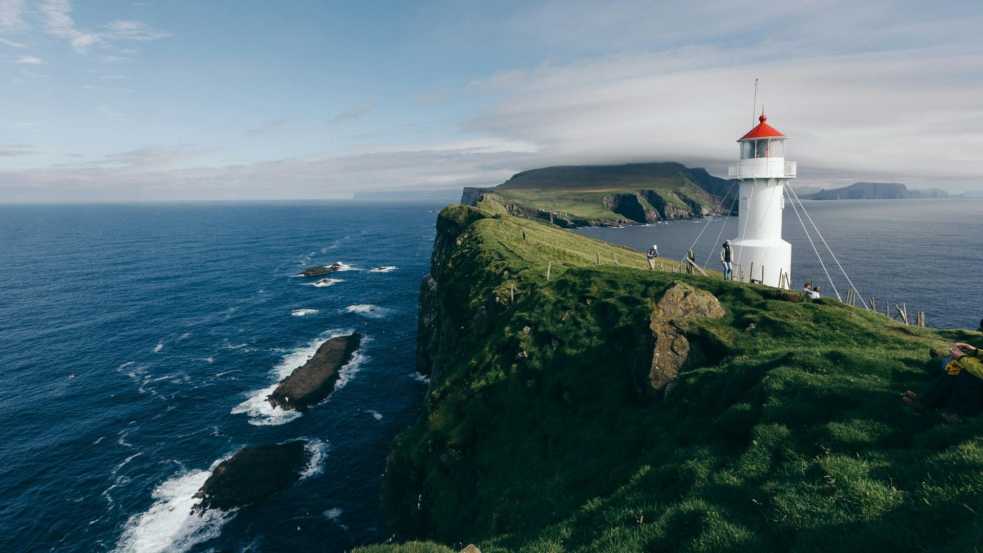 lighthouse near body of water