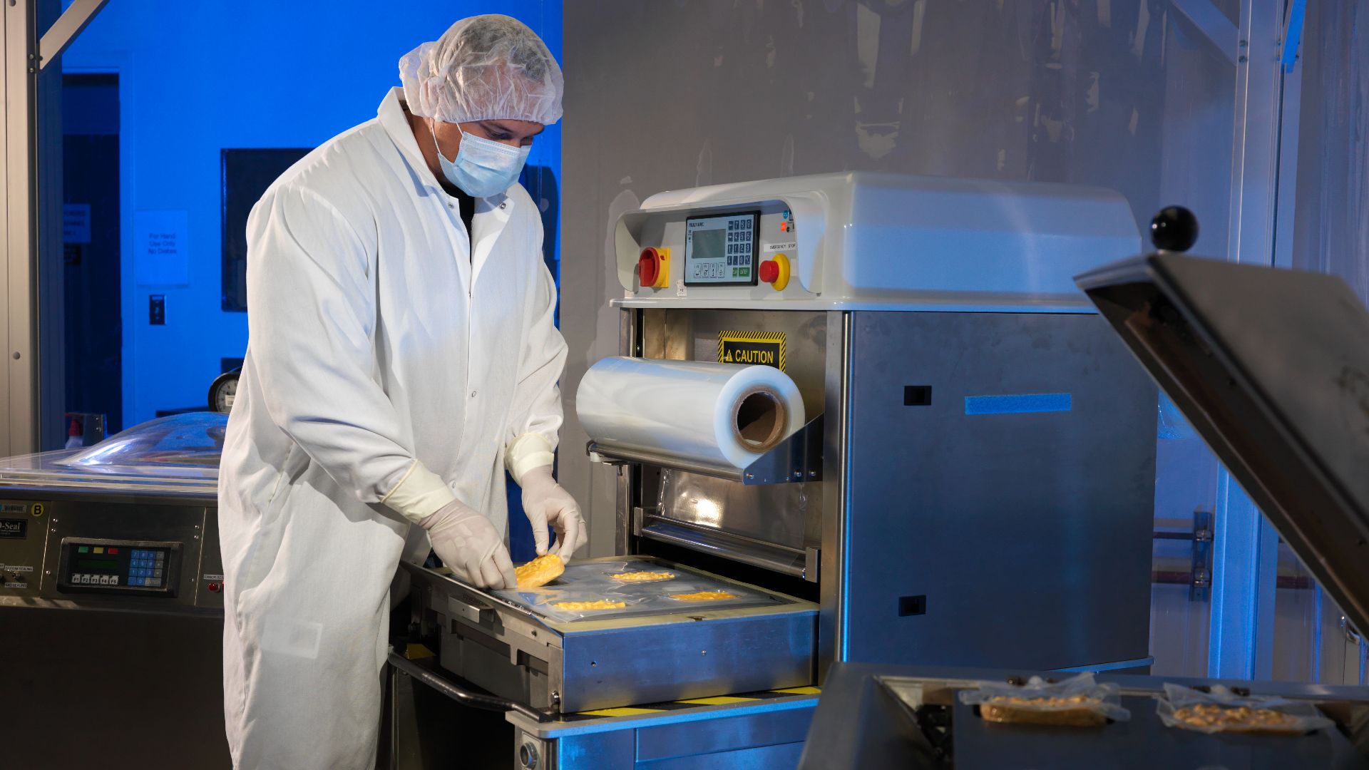 File:Food lab scientist packages food for spaceflight at Space Food Lab.jpg
