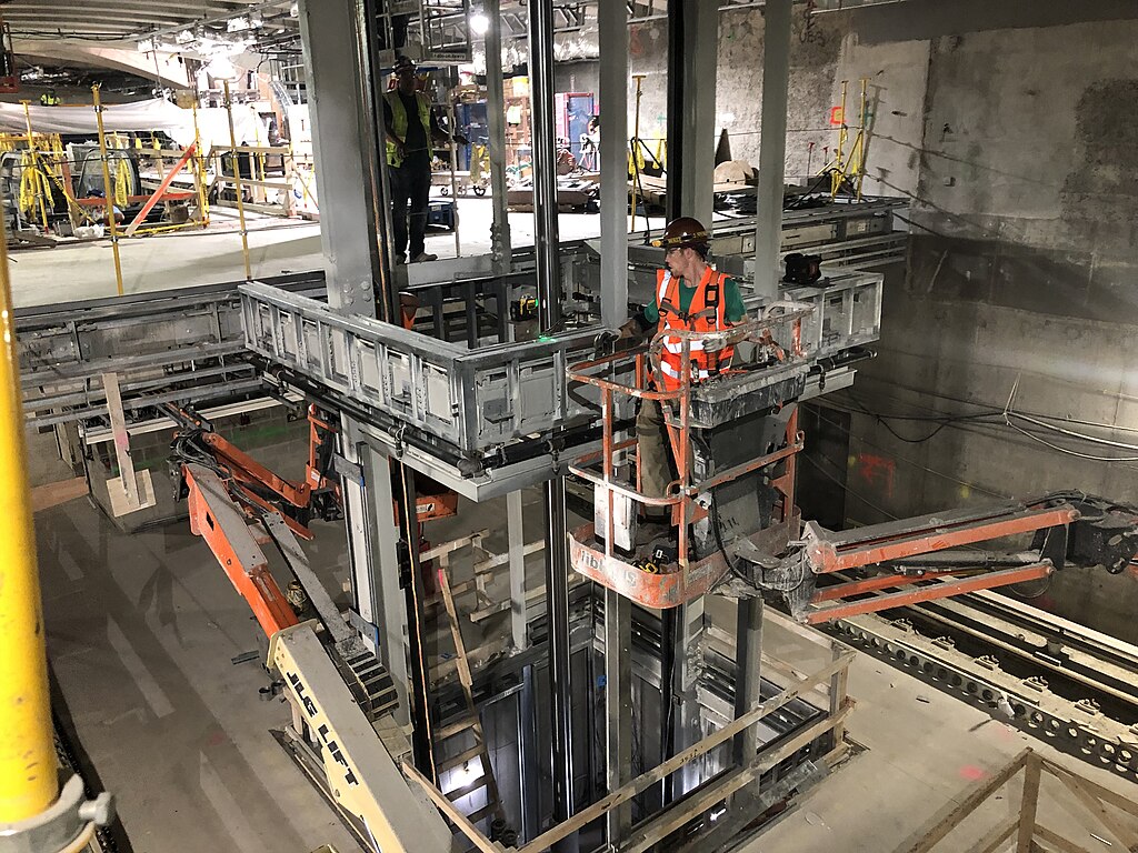 Elevator mechanics at work