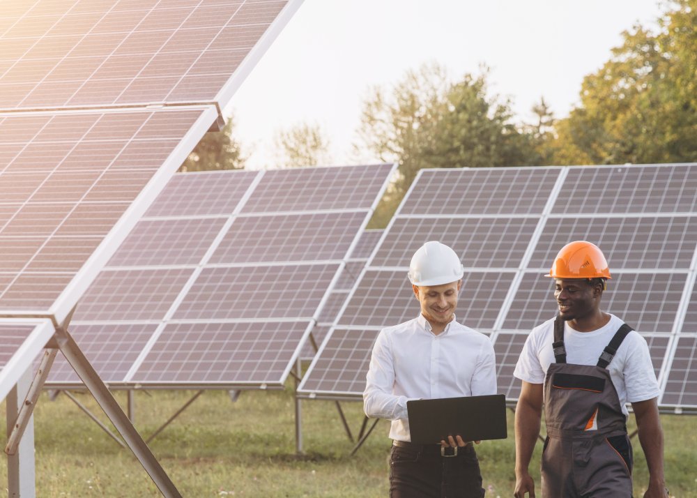 Engineers Discuss Solar Panel Efficiency at Renewable Energy Site