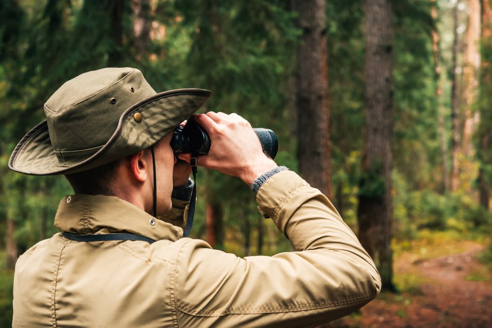 Portrait Photo of Ranger watching the territory, the protection of the reserve