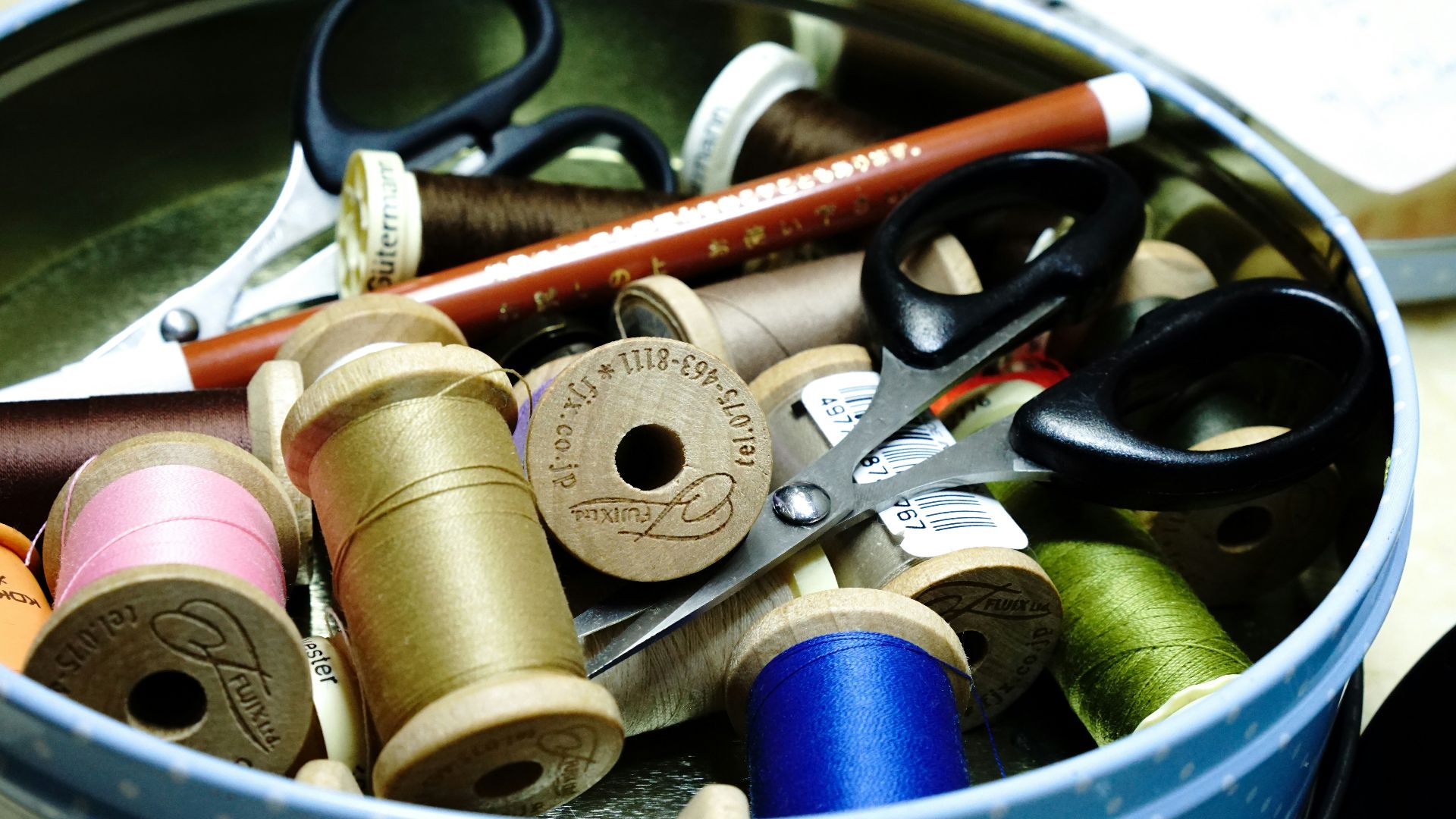 silver and red metal tools