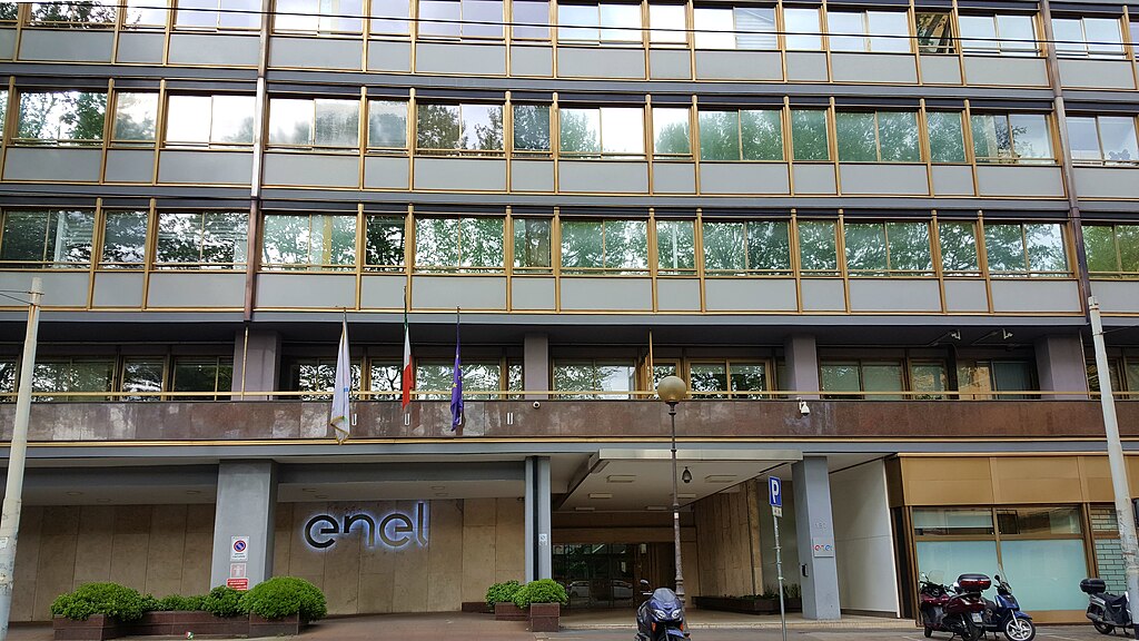 The image shows the corporate headquarters or office building of Enel Company