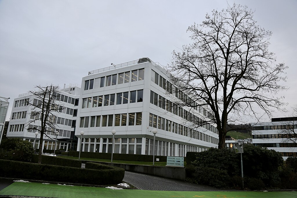 The image shows the corporate headquarters or office building of Glencore Company