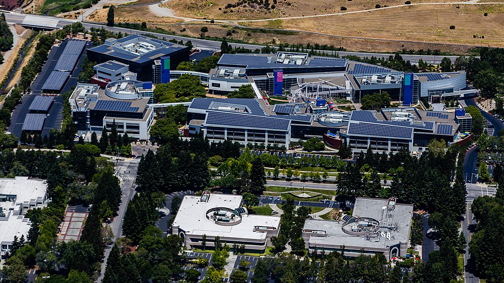 The image shows the corporate headquarters or office building of Alphabet Company