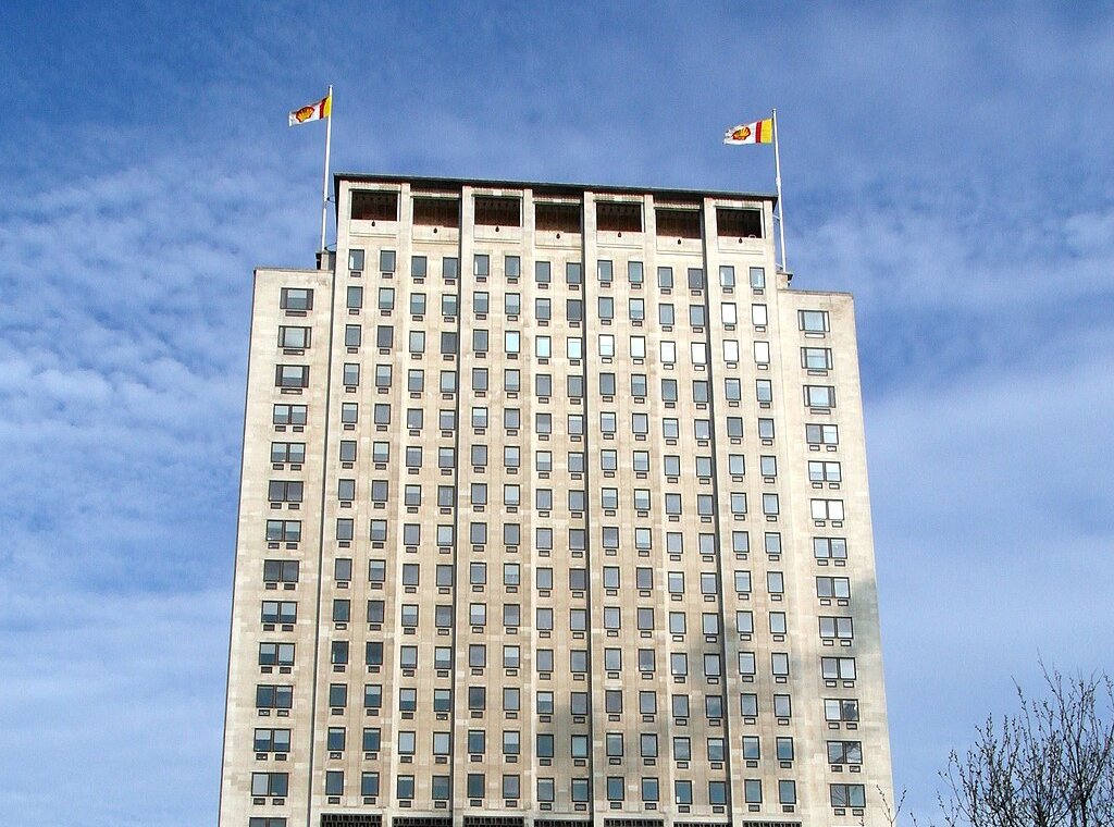 The image shows the corporate headquarters or office building of Shell Company