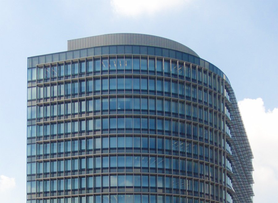 The image shows the corporate headquarters or office building of Toyota Company