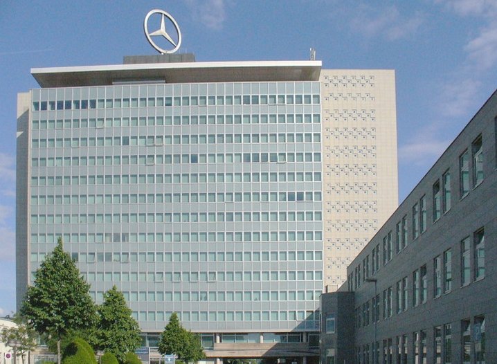 The image shows the corporate headquarters or office building of Mercedes-Benz Group Company