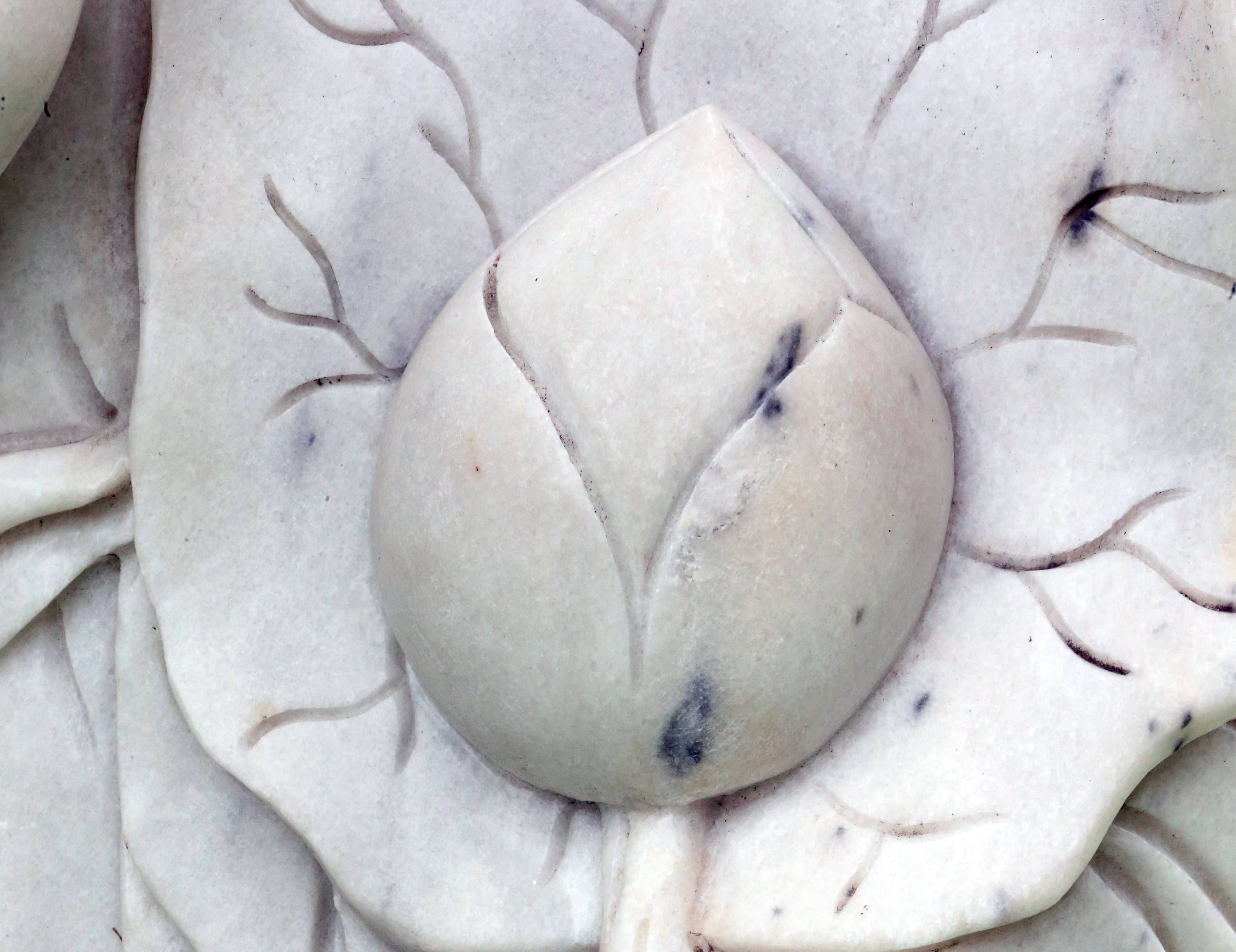 Quan The Am buddhist pagoda. Buddhist monk statue with lotus flower.