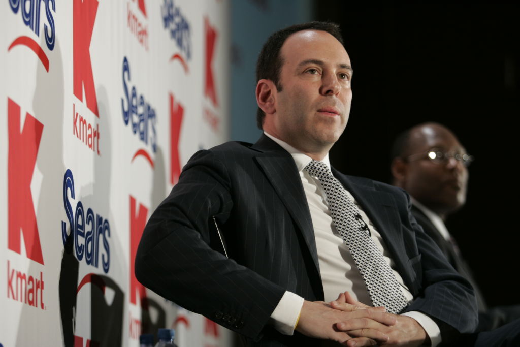 Kmart chairman Edward Lampert, left, speaks during a news conference
