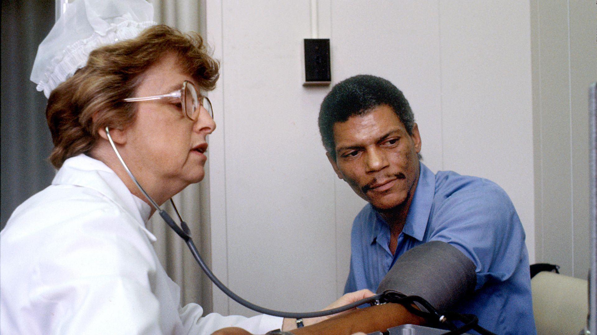 File:Nurse checks blood pressure.jpg