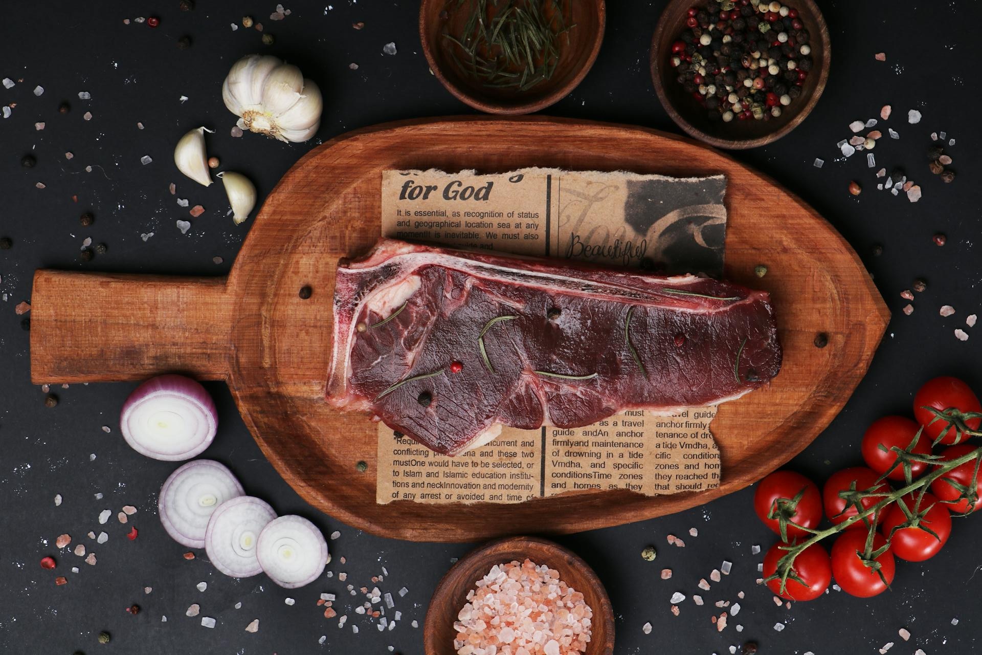 A Steak on a Wooden Cutting Board