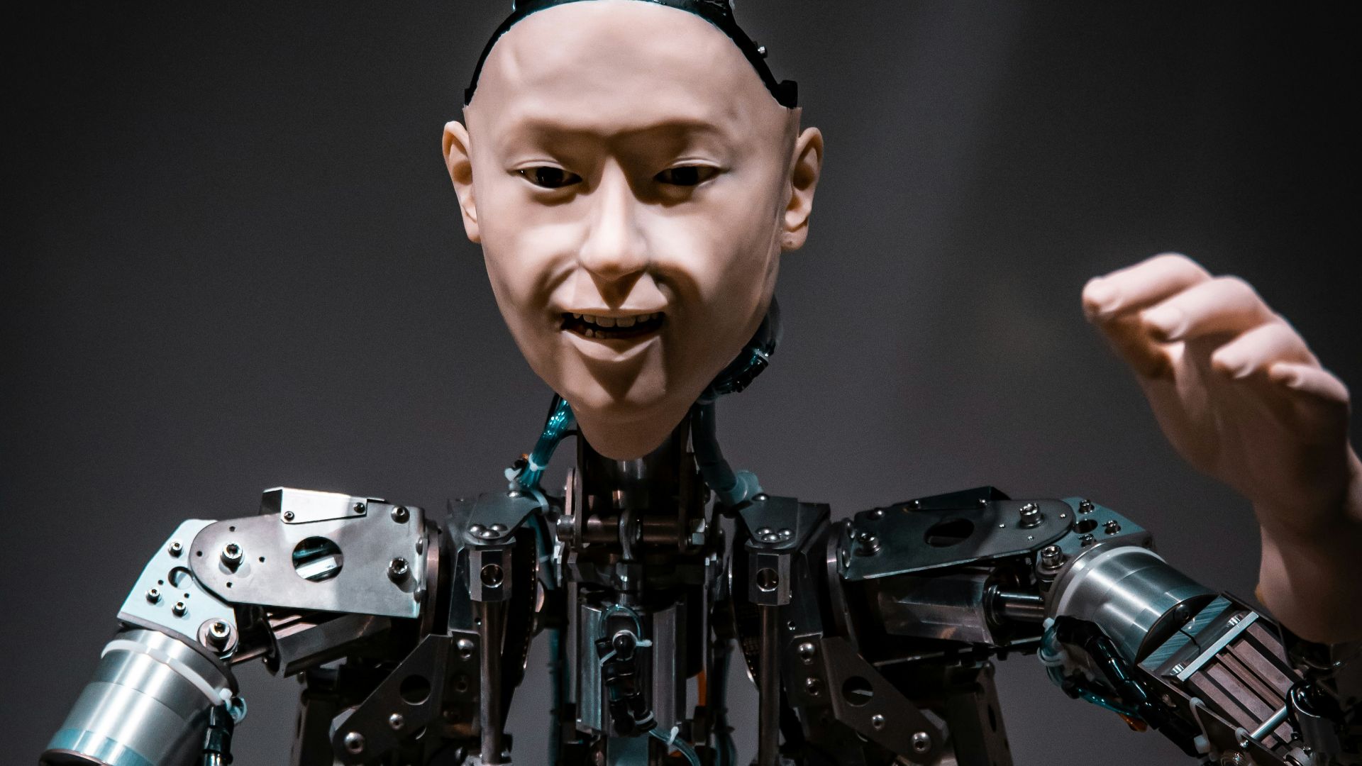 man in black and gray suit action figure