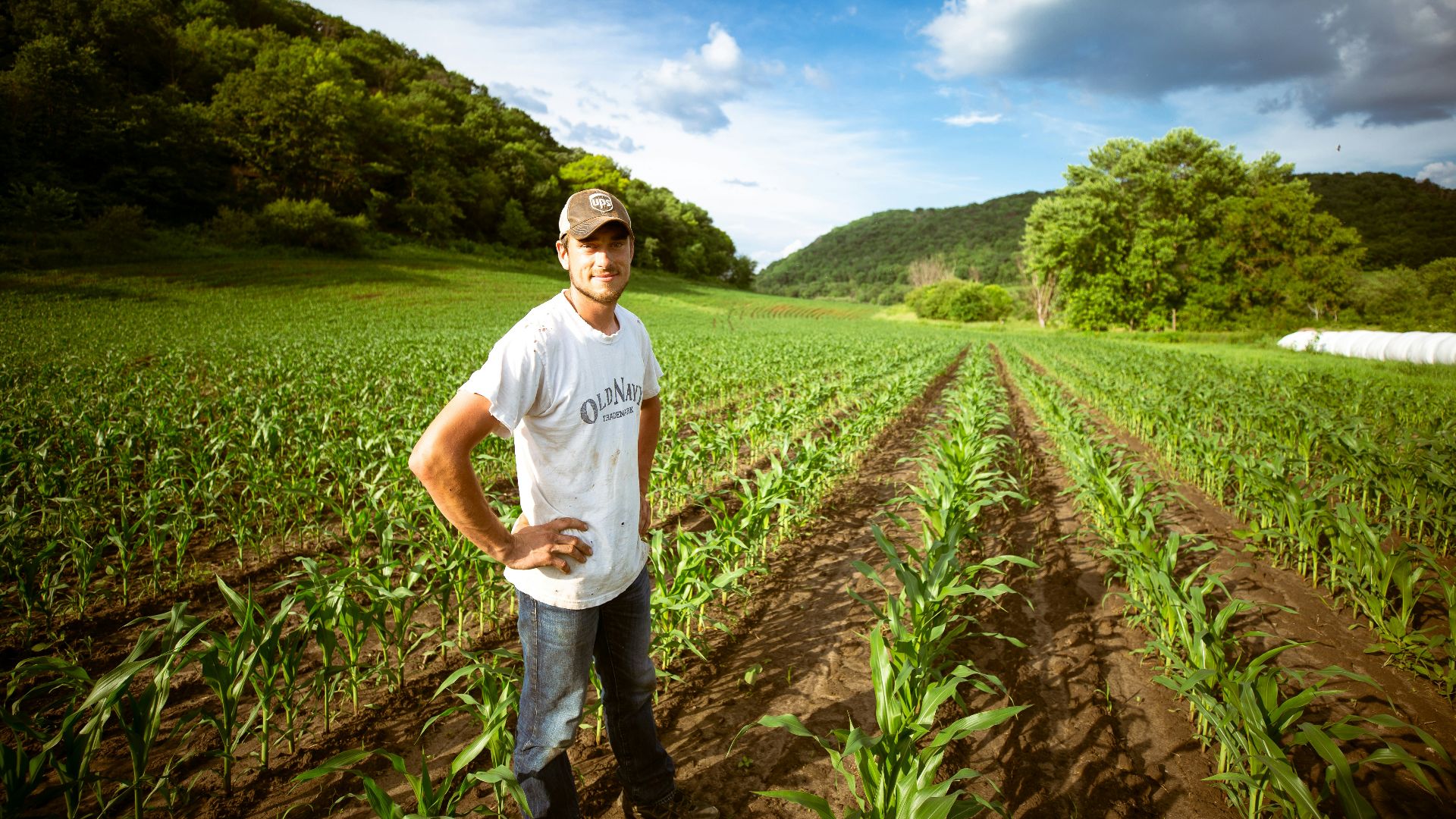 man standing on garden during daytime