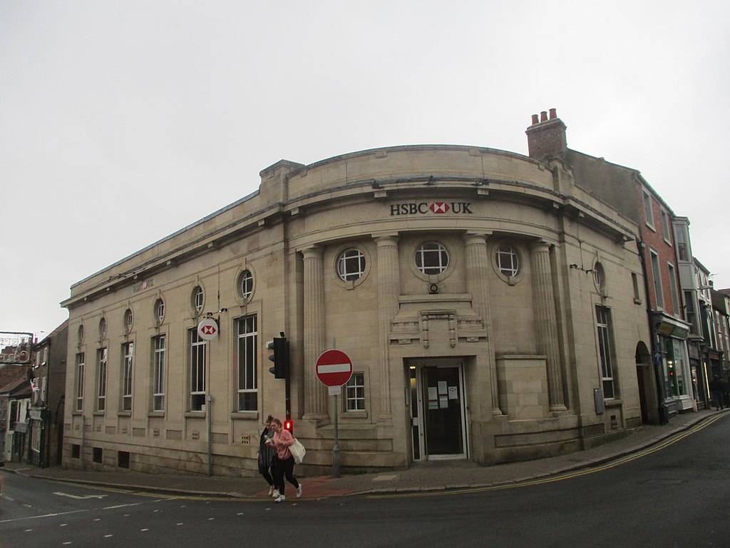 The image shows the corporate headquarters or office building of HSBC Company