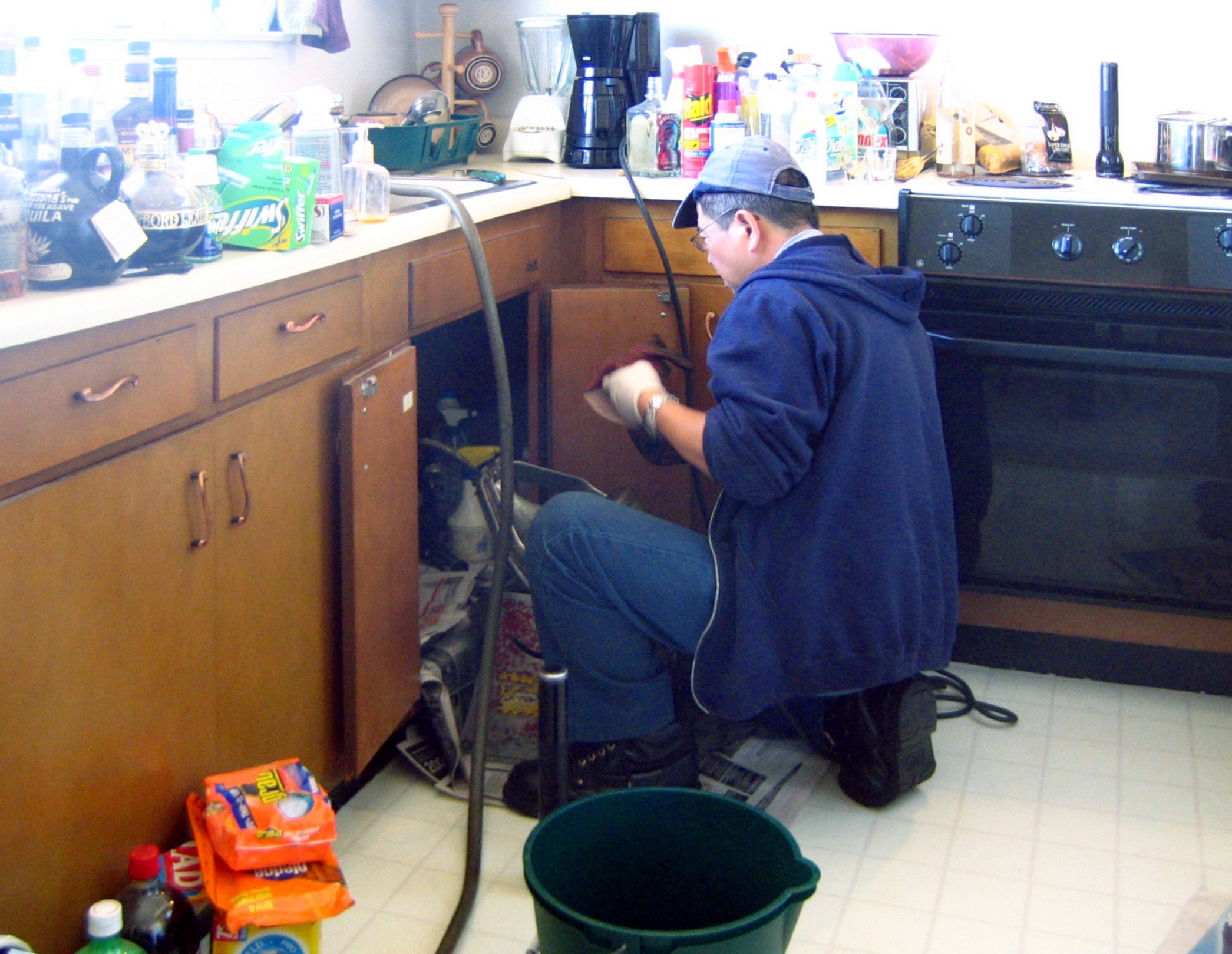 File:Plumber at work (retouched).jpg
