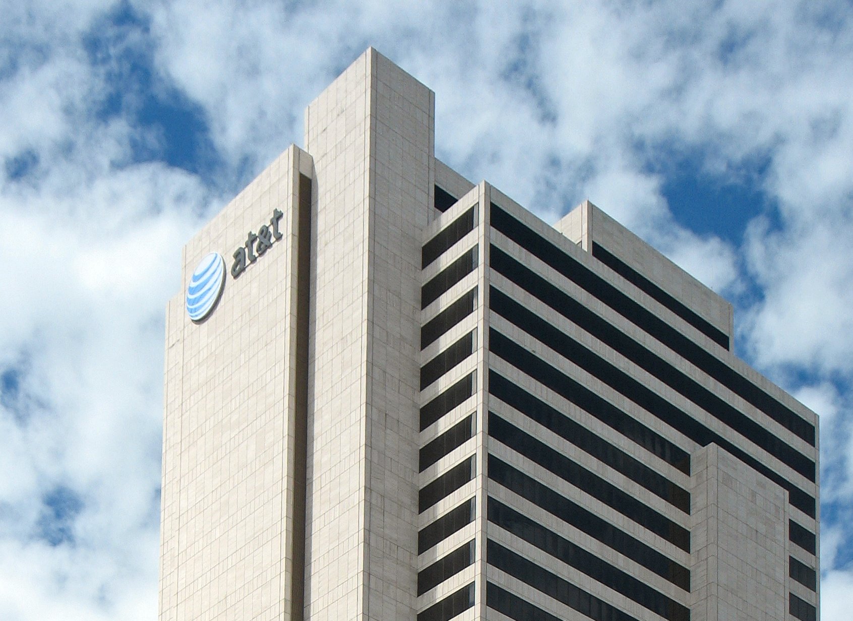 The image shows the corporate headquarters or office building of AT&T Company
