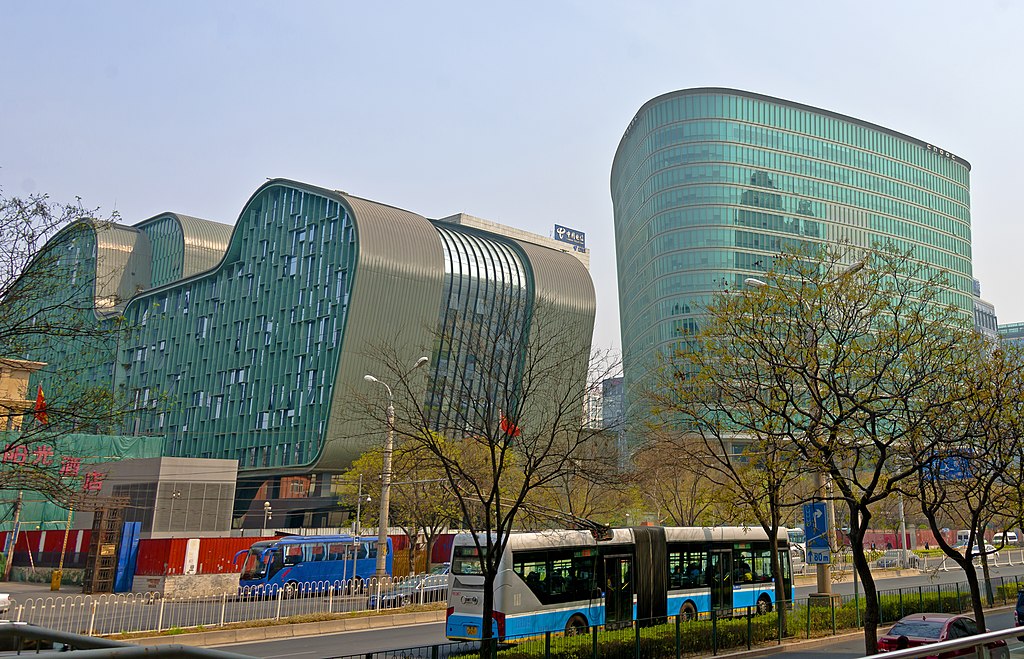 The image shows the corporate headquarters or office building of CNOOC Group Company