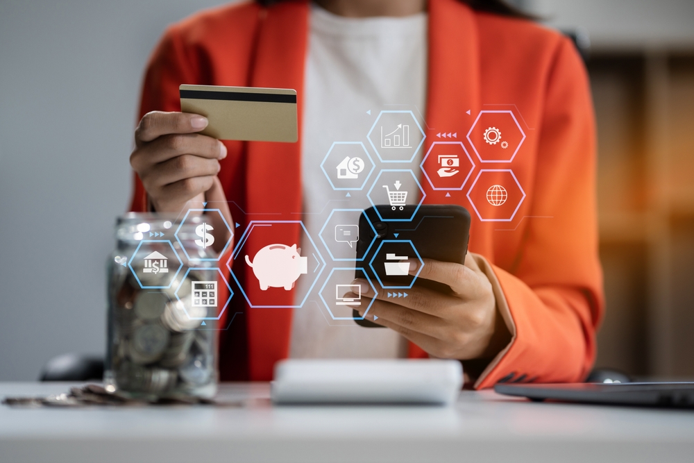 Businesswoman calculating monthly office expenses