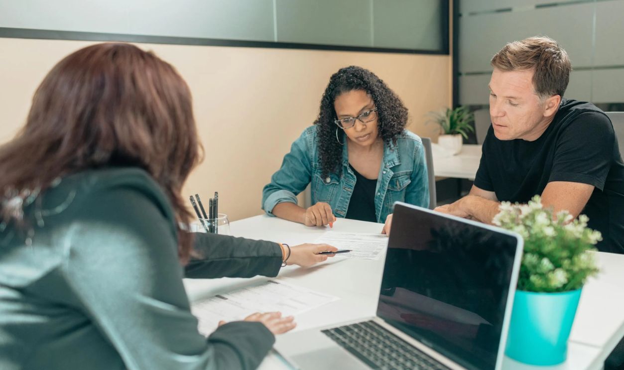 couple sitting together with an advisor