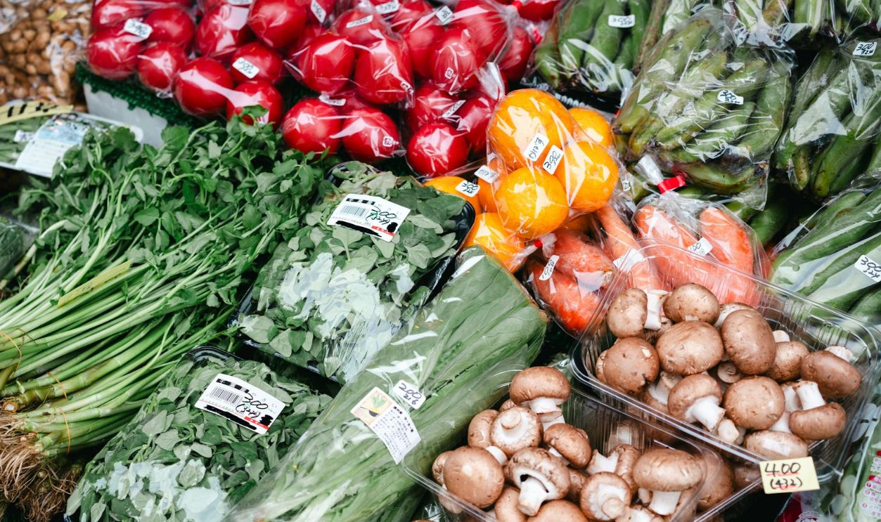 A display of vegetables and fruits at a market