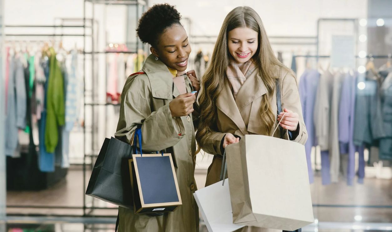 A Woman Holding a Brown Shopping Bag