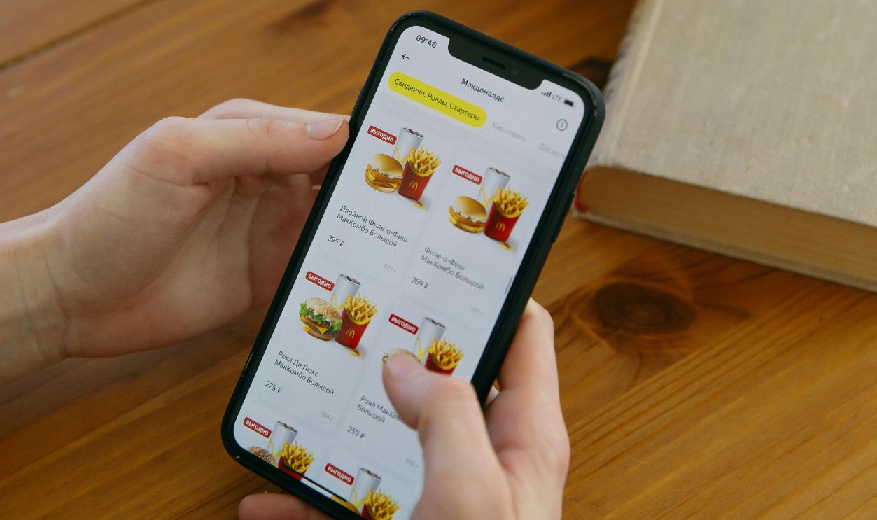 Person Ordering Food Online Using Mobile Phone